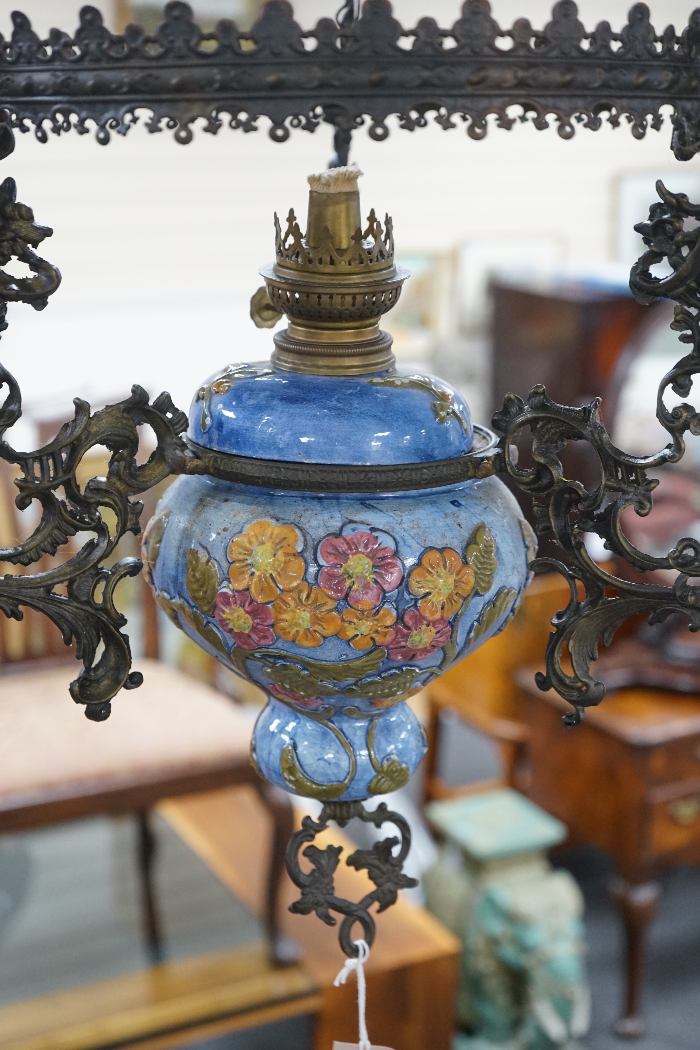 A Victorian ceiling pendant oil lamp rococo style cast brass frame, approximately 96cms high